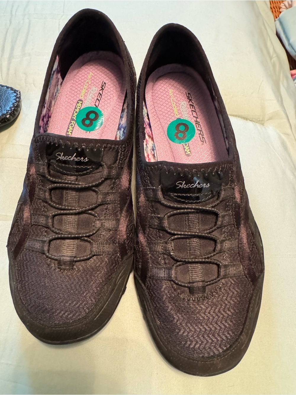 Skechers Women's Black Slip-On Sneakers with Pink Insoles